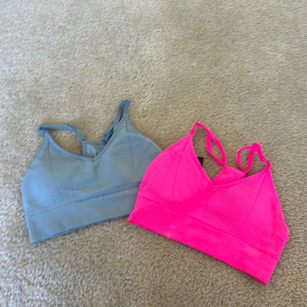 PINK two sports bras one blue one pink